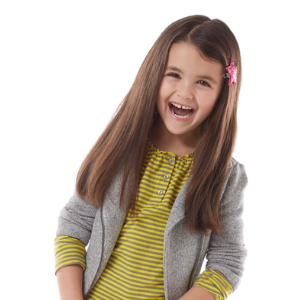 girl laughing during Snip-its haircut adventure with pink star clip in hair